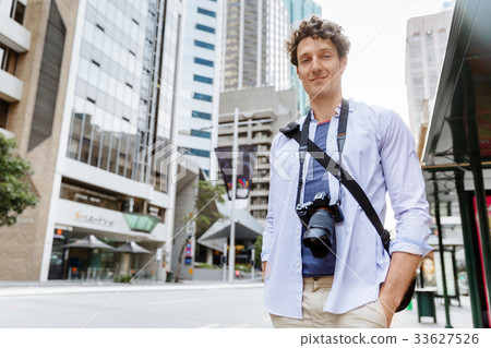 Male tourist in city Male tourist in city 33627526