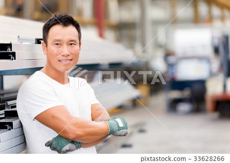 Asian worker in production plant on the factory floor Asian worker in production plant on the factory floor 33628266