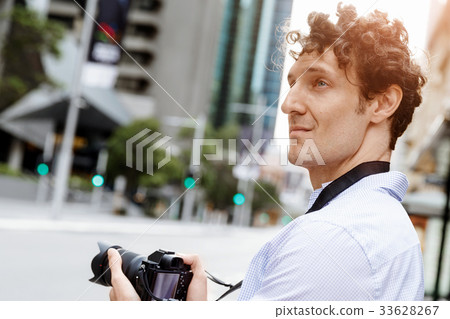 Male photographer taking picture Male photographer taking picture 33628267