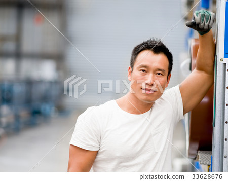 Asian worker in production plant on the factory floor Asian worker in production plant on the factory floor 33628676