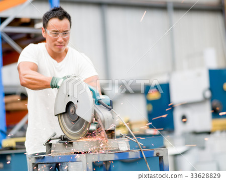 Asian worker in production plant on the factory floor Asian worker in production plant on the factory floor 33628829