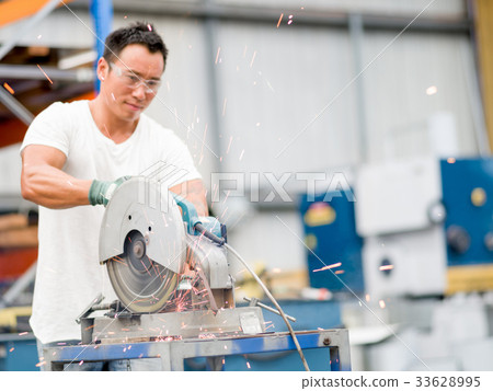 Asian worker in production plant on the factory floor Asian worker in production plant on the factory floor 33628995