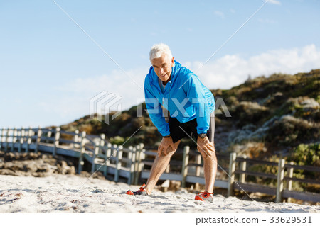 Athlete man tired after long running Athlete man tired after long running 33629531