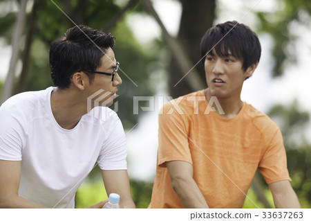Two young men jogging during a break 33637263