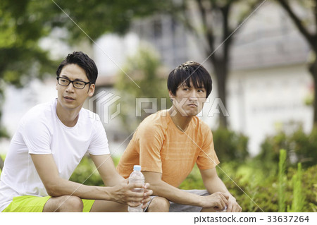 Two young men jogging on a bench 33637264