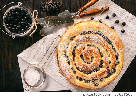 Homemade poppy seed cake with aronia berries. 33638503