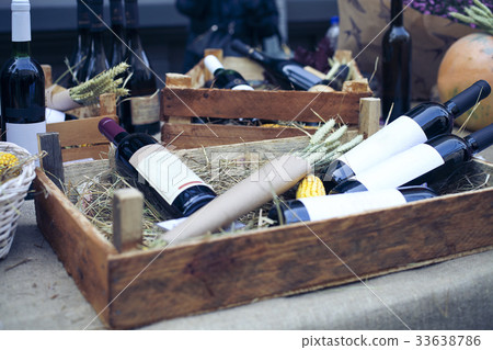 Wine bottles in wooden boxes Wine bottles in wooden boxes 33638786