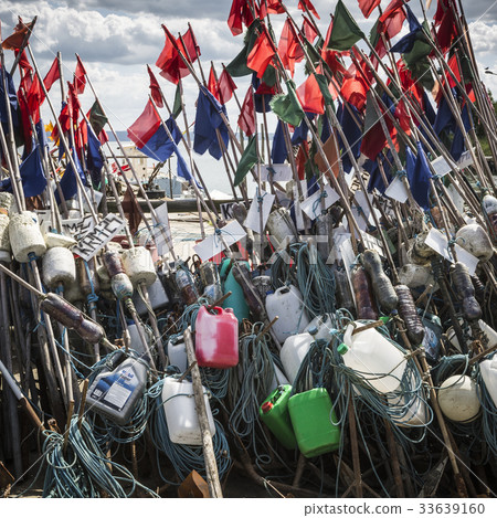 Network fishing drying on the beach in sunny day. Network fishing drying on the beach in sunny day. 33639160