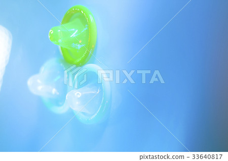 Rubber condom contraceptive 33640817