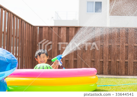 Garden pool lawn boy water play 33644541