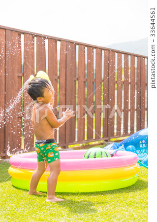 Garden pool lawn boy water play 33644561