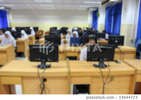 Blur Student with teacher and desktop computer Blur Student with teacher and desktop computer 33644723