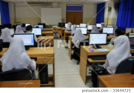 Blur Student with teacher and desktop computer Blur Student with teacher and desktop computer 33644725