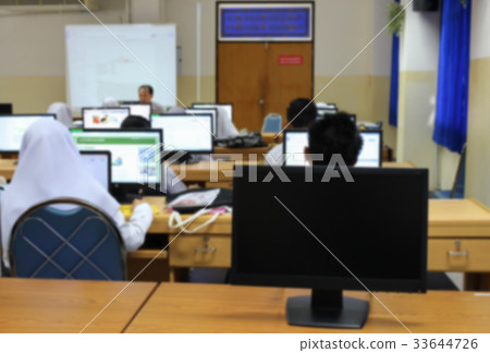 Blur Student with teacher and desktop computer Blur Student with teacher and desktop computer 33644726