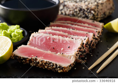 Seared ahi tuna with sesame seeds and soy sauce 33646918