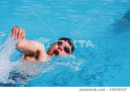 swimmer swimming competition pool. 33649547