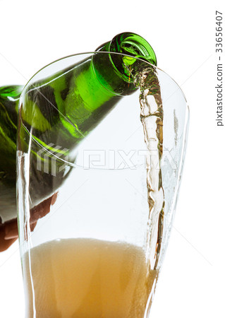 Glass of beer and bottle Glass of beer and bottle 33656407