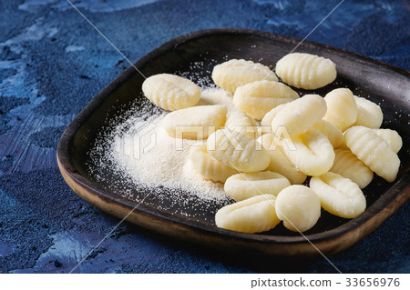 Raw uncooked potato gnocchi Raw uncooked potato gnocchi 33656976