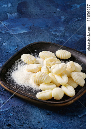 Raw uncooked potato gnocchi Raw uncooked potato gnocchi 33656977