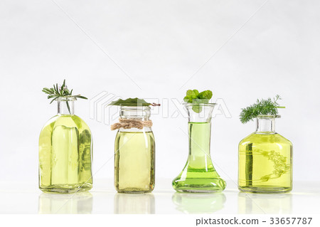 Various Bottle of  essential oils  of fresh plants 33657787