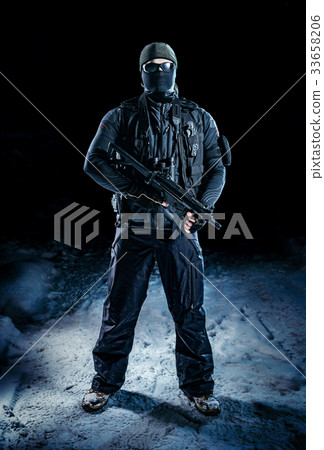 Military man with weapon 33658206