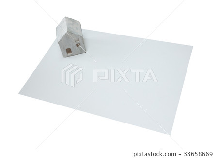 Small house on a white card Small house on a white card 33658669