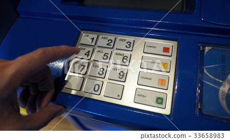 Blue color ATM machine and white button keypad. Blue color ATM machine and white button keypad. 33658983