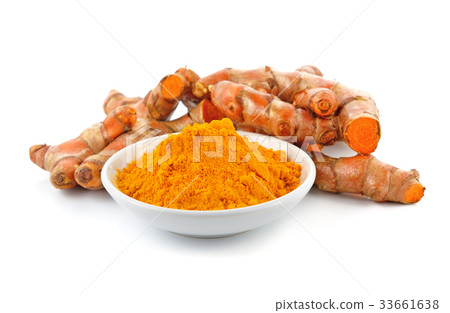 Turmeric roots with turmeric powder on white 33661638