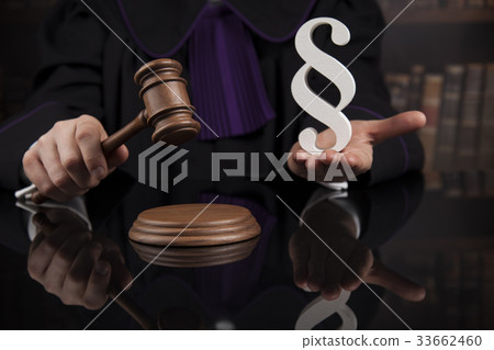 Striking mallet, Judgment concept, book background Striking mallet, Judgment concept, book background 33662460