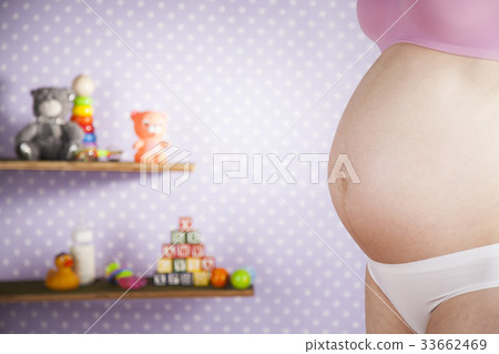 Young pregnant lady touching her belly, Pregnancy Young pregnant lady touching her belly, Pregnancy 33662469