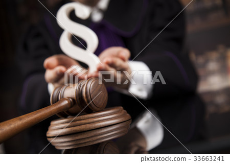 Striking mallet, Judgment concept, book background Striking mallet, Judgment concept, book background 33663241