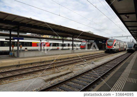 Passenger train at the station 33664095