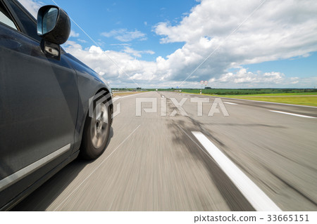 The car moves at great speed. The car moves at great speed. 33665151