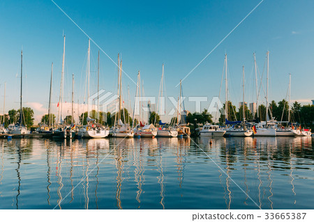 Many Yachts Moored At The City Pier Harbour And Many Yachts Moored At The City Pier Harbour And 33665387