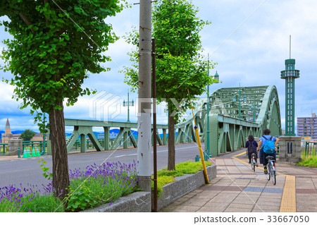Asahi Bridge over the Ishikari River in Asahikawa Showa-dori Asahi Bridge over the Ishikari River in Asahikawa Showa-dori 33667050