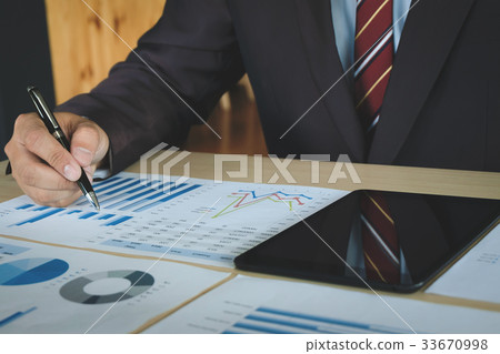 business man working on business documents 33670998