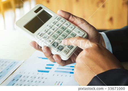 business man working on business documents business man working on business documents 33671000