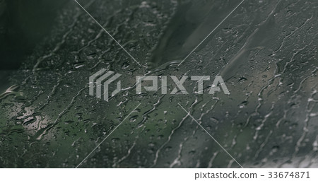 Close up of outside view through car window with 33674871