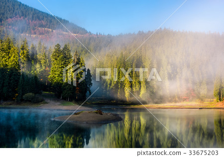 mountainous lake in foggy forest mountainous lake in foggy forest 33675203