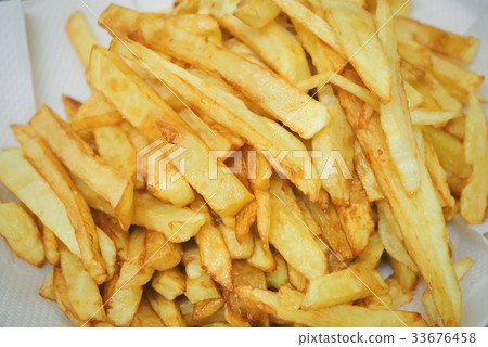 Golden Pile of Homemade Fried French Fries Golden Pile of Homemade Fried French Fries 33676458