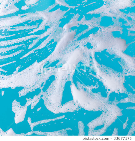 soap foam on a blue background soap foam on a blue background 33677175