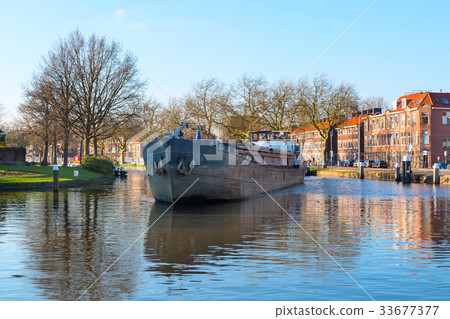 Ship at the canal of Delft, Holland and dutch 33677377
