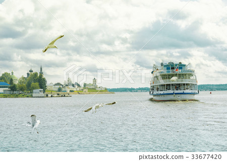 Tourist Ship floats on the water of the Volga Tourist Ship floats on the water of the Volga 33677420