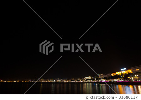 Cannes beach night view, France 33680117