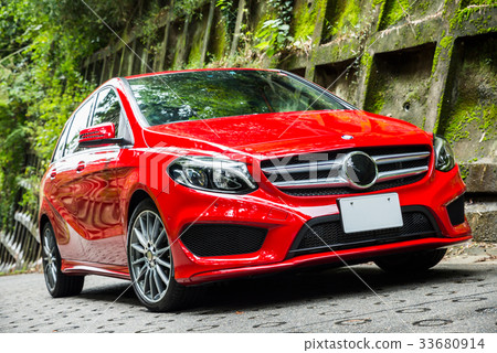 Landscape of a protective wall with red car and moss Landscape of a protective wall with red car and moss 33680914