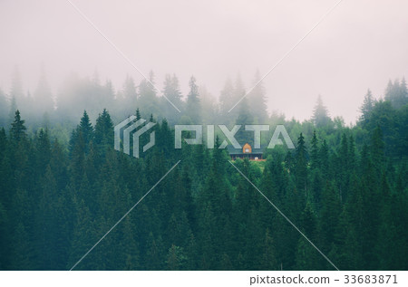 Little house on a green mountain slope Little house on a green mountain slope 33683871