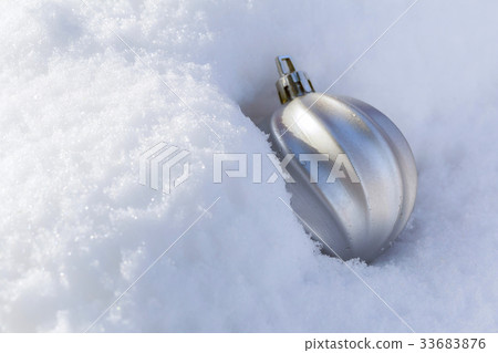 Silver glitter ball on silver background. Silver glitter ball on silver background. 33683876
