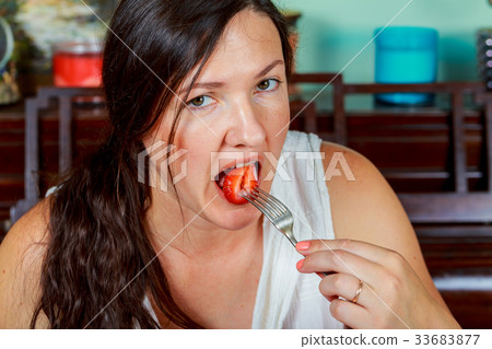 Sexy Woman Eating Strawberry. Sensual Red Sexy Woman Eating Strawberry. Sensual Red 33683877