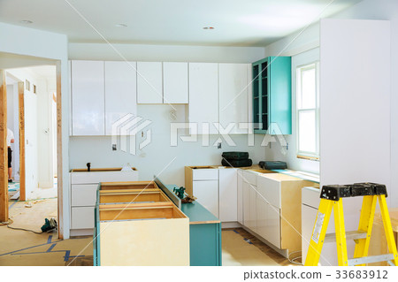 Installation of kitchen cabinet. Installation of kitchen cabinet. 33683912