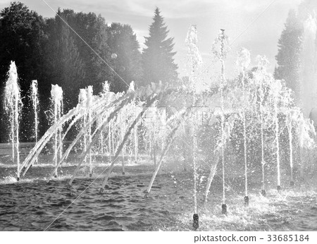 The gush of water of a fountain. The gush of water of a fountain. 33685184